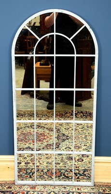 Lot 3015 - A modern painted metal mirror modelled as an...