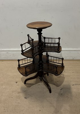 Lot 1078 - An reproduction walnut tripod occasional table,...