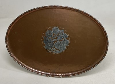 Lot 215 - HUGH WALLACE; an oval tray with a floral...