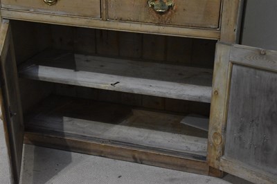 Lot 1042 - An old pine dresser, with boarded plate rack...