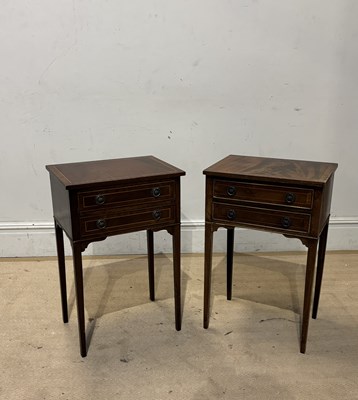 Lot 1100 - A pair of reproduction mahogany two drawer...