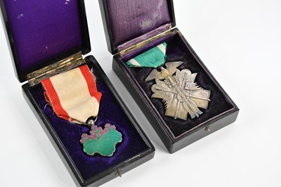 Lot 218 - A Japanese Order of The Golden Kite, and an...