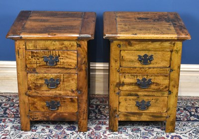 Lot 3061 - A pair of modern stained wood three drawer...
