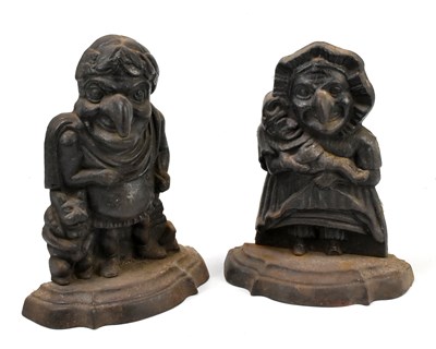 Lot 306 - A pair of cast iron door stops