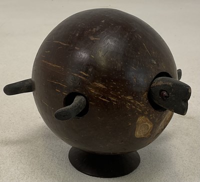 Lot 44 - A novelty coconut husk carved as a turtle,...