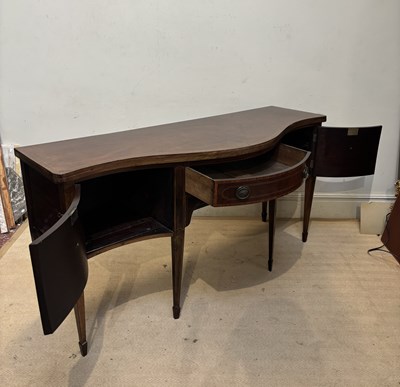 Lot 1140 - A George III inlaid mahogany serpentine...
