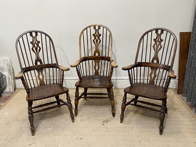 Lot 1101 - Three reproduction elm seated Windsor back...