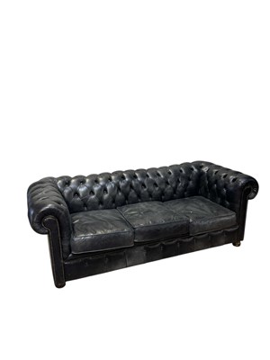 Lot 1069 - A contemporary black leather Chesterfield...