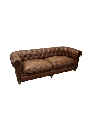 Lot 1074 - A modern brown leather Chesterfield style...