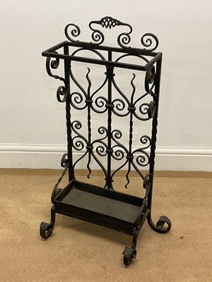 Lot 217 - An Arts and Crafts forged umbrella stand,...