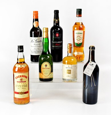Lot 1011 - A mixed lot of spirits, comprising Arancia...