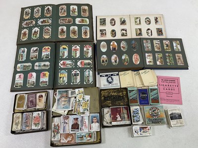 Lot 400 - Four albums of cigarette cards, together with...