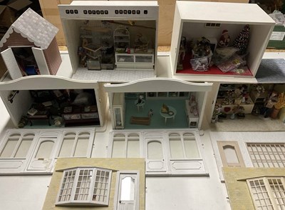 Lot 147 - Doll's house dioramas, to include cake shop, a...