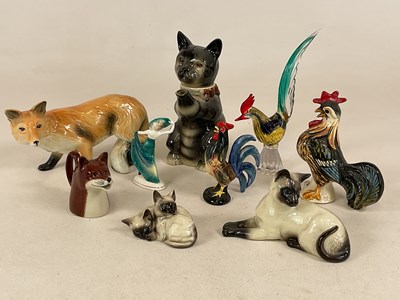 Lot 344 - A quantity of ceramic figures, including...