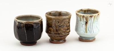 Lot 419 - MIKE DODD (born 1943); a trio of stoneware...