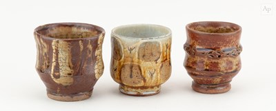 Lot 420 - MIKE DODD (born 1943); a trio of stoneware...