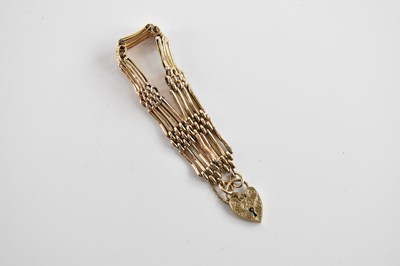 Lot 240 - A 9ct rose gold four bar gate link bracelet,...