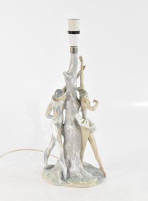 Lot 608 - A large figural table lamp representing a...