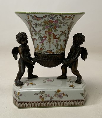 Lot 273 - A cherub mounted centrepiece, with maker's...