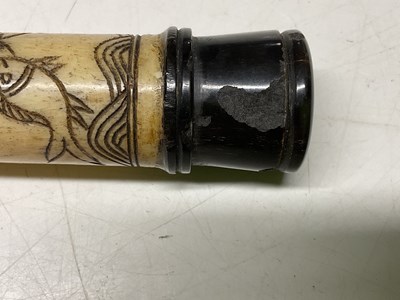 Lot 390 - A Chinese bone opium pipe, 47cm, decorated...