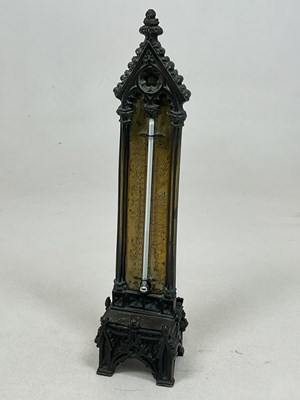 Lot 42 - A 19th century Gothic inspired brass...