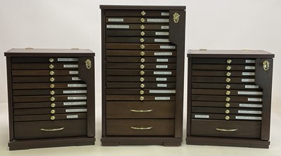 Lot 1368 - A coin cabinet with fourteen slim drawers...