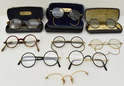 Lot 298 - Eight pairs of vintage glasses/spectacles,...