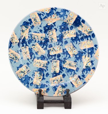 Lot 319 - JOHN POLLEX (born 1941); a slipware plate with...