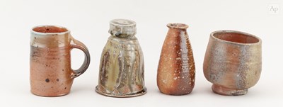 Lot 429 - NIC COLLINS (born 1958); a group of wood fired...