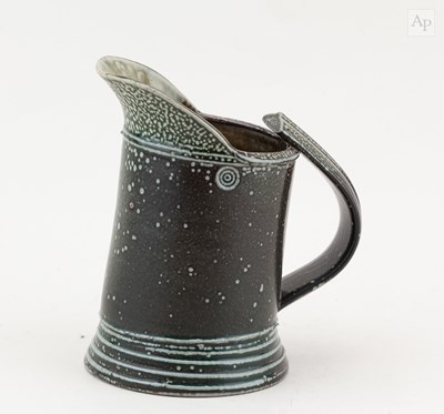 Lot 700 - WALTER KEELER (born 1942); a salt glazed jug,...