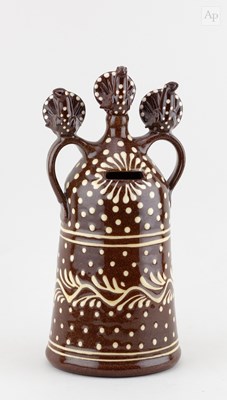 Lot 454 - PAUL YOUNG (born 1961); a slipware moneybox...