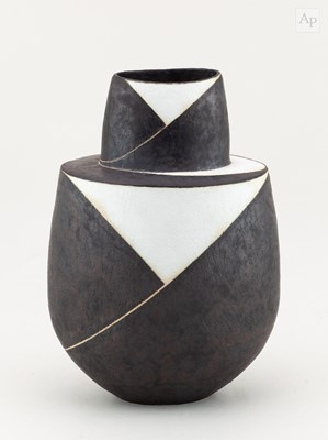 Lot 323 - JOHN WARD (1938-2023); an oval stoneware black...