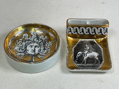 Lot 235 - FORNASETTI; a circular dished pin tray centred...