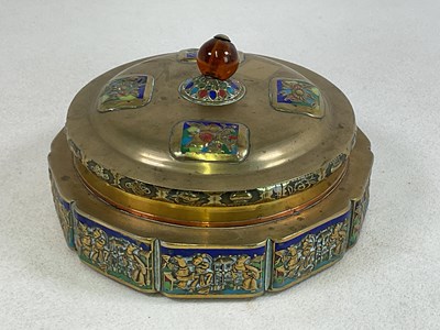 Lot 383 - A Chinese polished brass and enamel decorated...