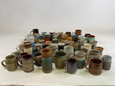 Lot 257 - A very large collection of studio pottery mugs,...