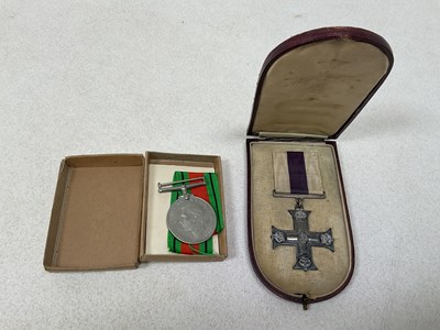 Lot 84 - A cased WWI Military Cross, unnamed and...