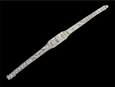 Lot 201 - A white metal diamond set bracelet of Art Deco...