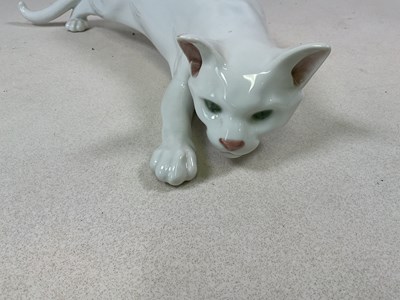 Lot 263 - ROYAL COPENHAGEN; a white glazed tom cat in...