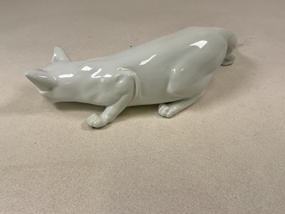 Lot 263 - ROYAL COPENHAGEN; a white glazed tom cat in...