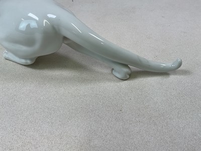 Lot 263 - ROYAL COPENHAGEN; a white glazed tom cat in...