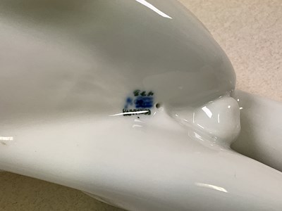 Lot 263 - ROYAL COPENHAGEN; a white glazed tom cat in...