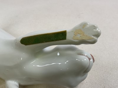 Lot 263 - ROYAL COPENHAGEN; a white glazed tom cat in...