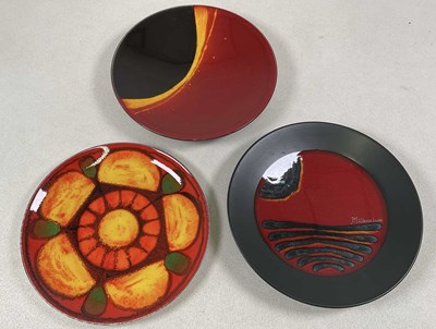 Lot 265 - POOLE POTTERY; three plates, to include...