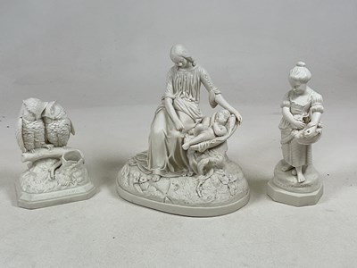 Lot 337 - A group of three Parian ware figures,...