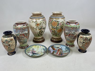 Lot 387 - Three pairs of Japanese ceramic vases, largest...