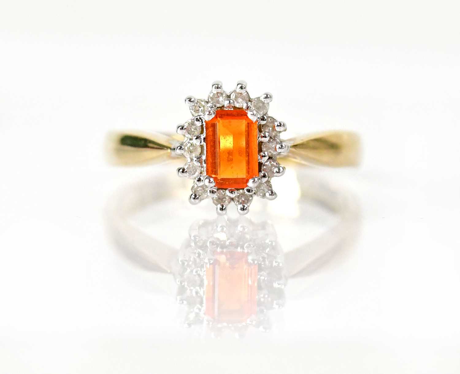 Lot 1047 - A 9ct yellow gold ring set with a rectangular...