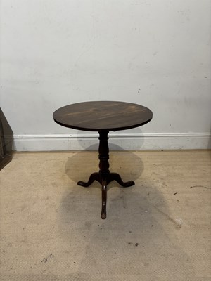 Lot 1054 - A Georgian mahogany tilt-top tripod table,...