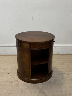 Lot 1095 - A reproduction mahogany cylindrical bookcase,...