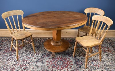 Lot 2992 - A group of three spindle back pine chairs,...