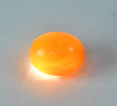 Lot 1090 - A cherry amber style graduated bead necklace,...